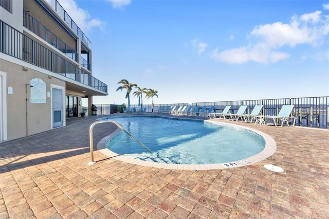 view of pool with a patio area