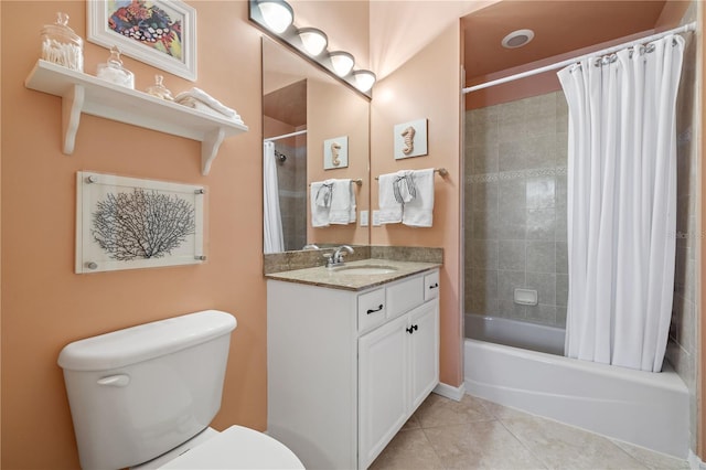 full bathroom featuring tile patterned flooring, vanity, toilet, and shower / bathtub combination with curtain