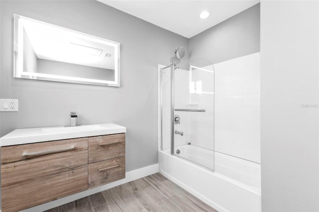 bathroom featuring vanity and tub / shower combination