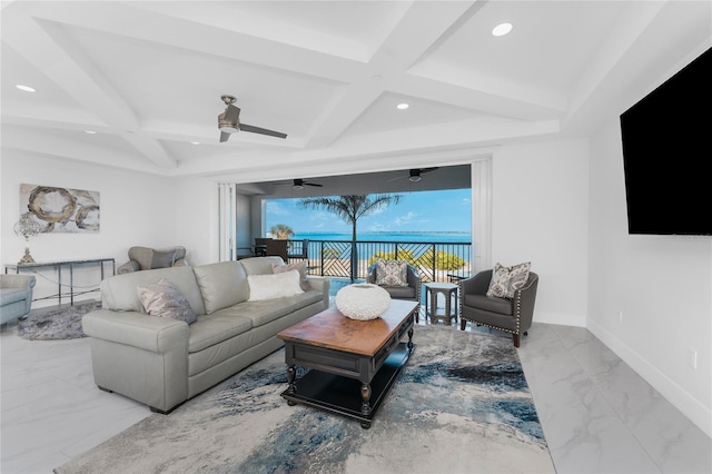 living room featuring ceiling fan, coffered ceiling, and beam ceiling