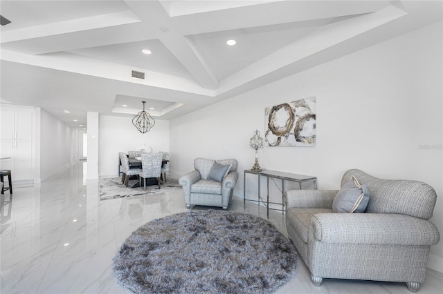 living area featuring a notable chandelier