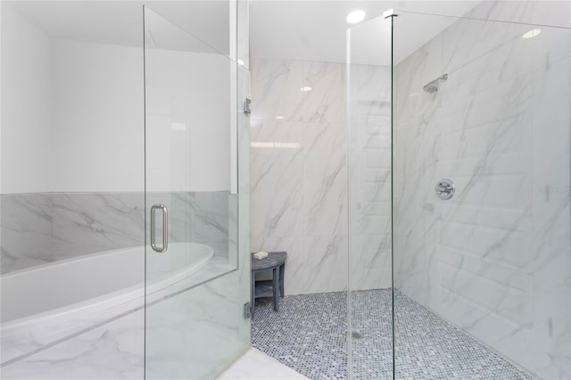 bathroom with independent shower and bath