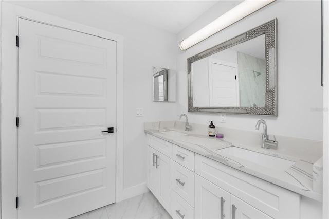 bathroom featuring vanity and a shower