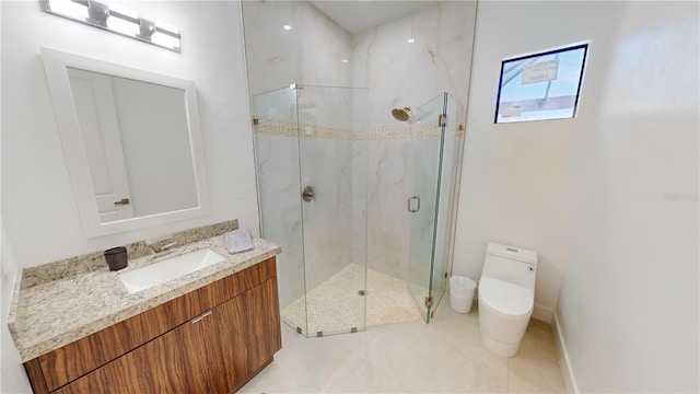 bathroom featuring tile patterned floors, vanity, toilet, and a shower with shower door