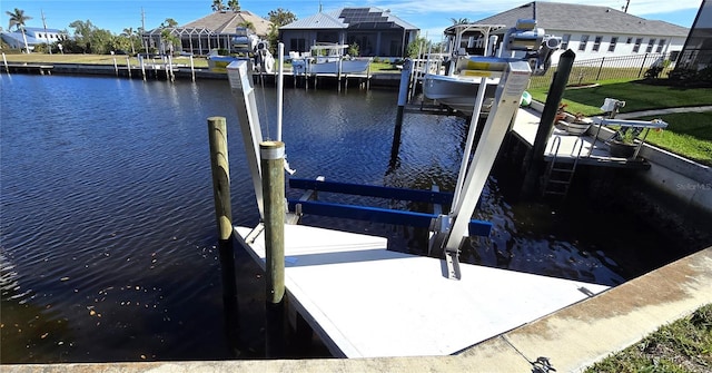 dock area featuring a water view