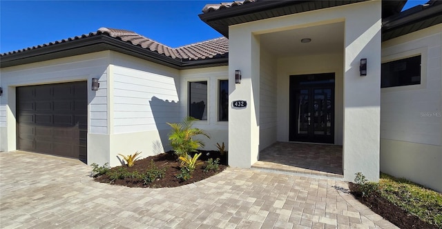 property entrance featuring a garage