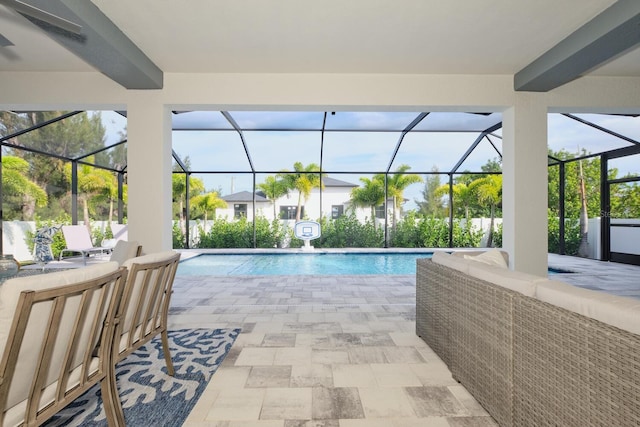 view of pool with a lanai, a patio area, and an outdoor hangout area