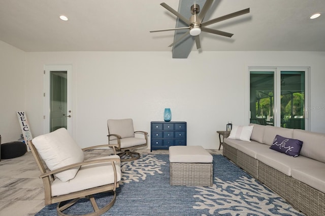 living room with ceiling fan