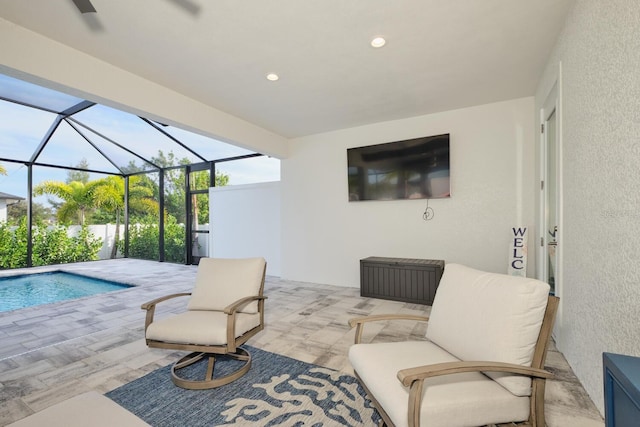 view of patio featuring a lanai