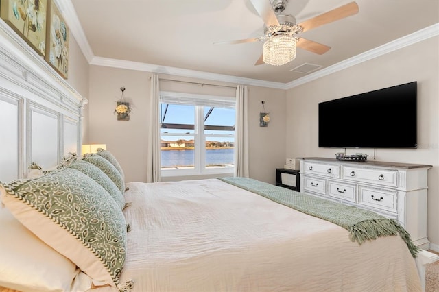 bedroom with ceiling fan and ornamental molding