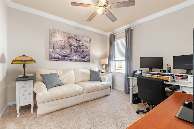 carpeted home office with ceiling fan and ornamental molding