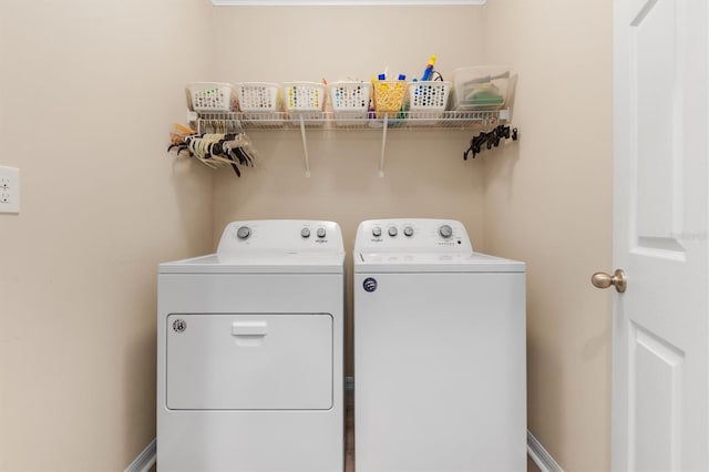 laundry area featuring washing machine and dryer