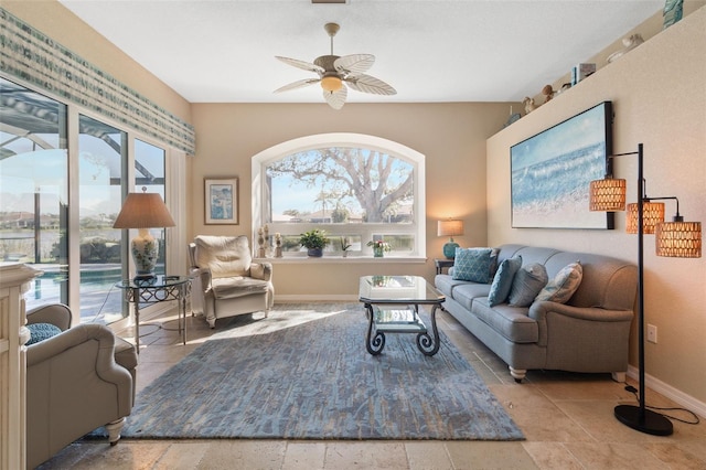 living room featuring ceiling fan