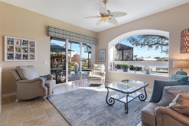 living room with ceiling fan