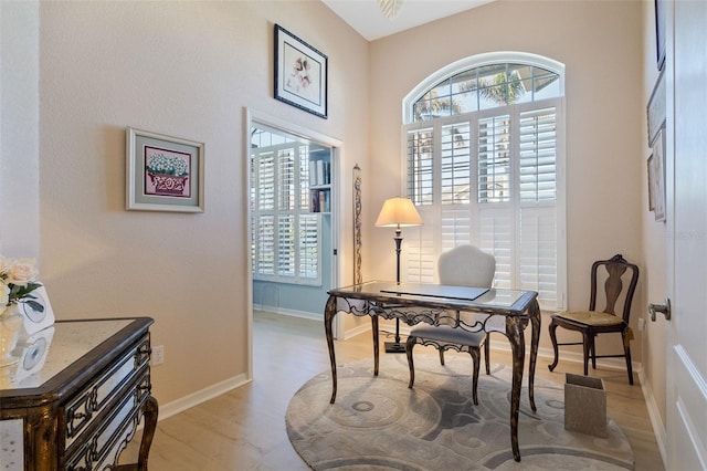 home office with light wood-type flooring