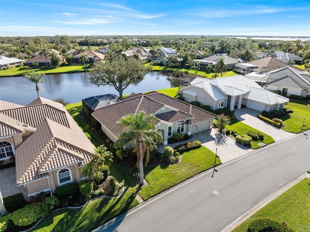 bird's eye view with a water view