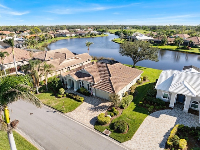 bird's eye view with a water view