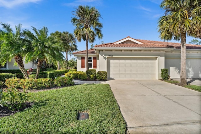 mediterranean / spanish-style home featuring a garage