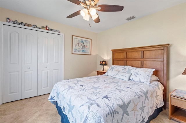 bedroom featuring a closet and ceiling fan