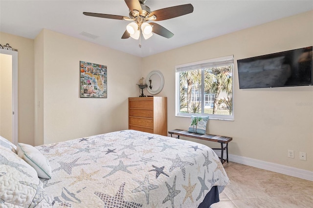 bedroom featuring ceiling fan and light tile patterned flooring