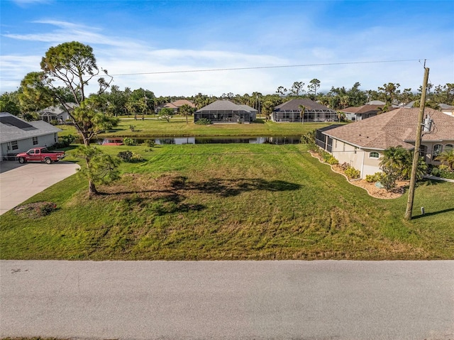 view of front of property featuring a water view