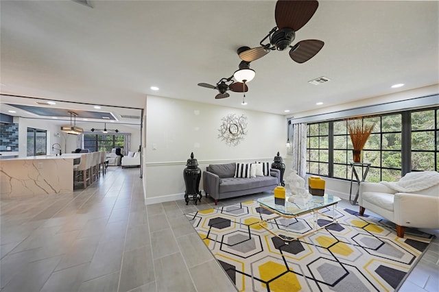 living room with ceiling fan