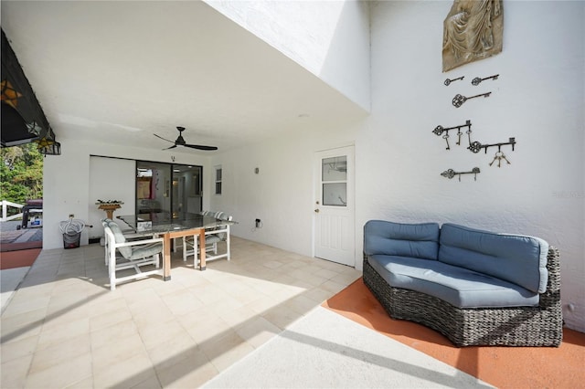 view of patio featuring ceiling fan and an outdoor hangout area