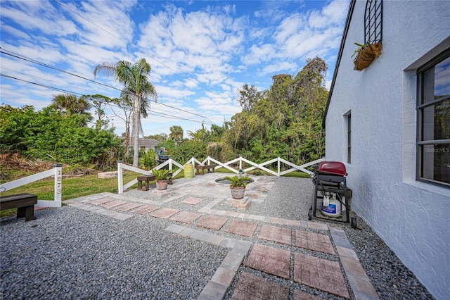 view of patio with a grill