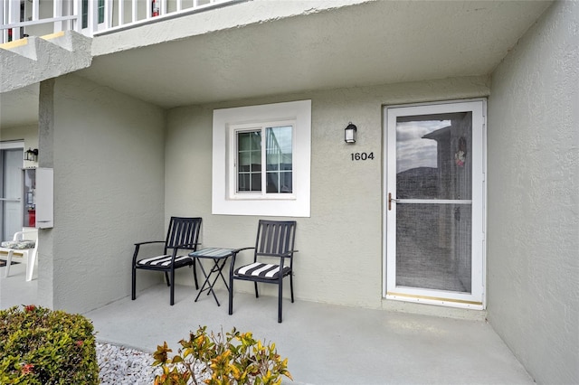 property entrance with a balcony