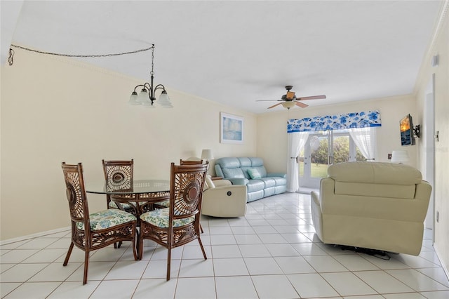 living room featuring ceiling fan with notable chandelier, crown molding, and light tile patterned flooring