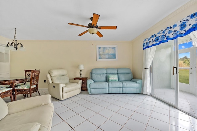 living room with ceiling fan with notable chandelier and light tile patterned flooring