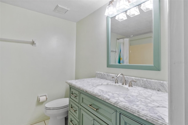 bathroom with tile patterned floors, vanity, toilet, and a shower with curtain