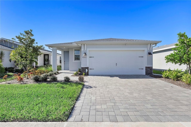 view of front of home with a garage