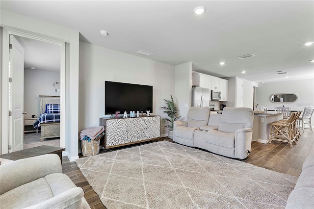 living room featuring a fireplace