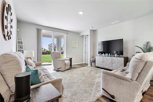 living room with hardwood / wood-style floors