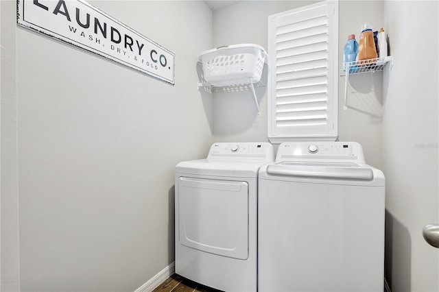 laundry room with separate washer and dryer