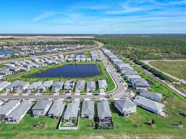 drone / aerial view with a water view