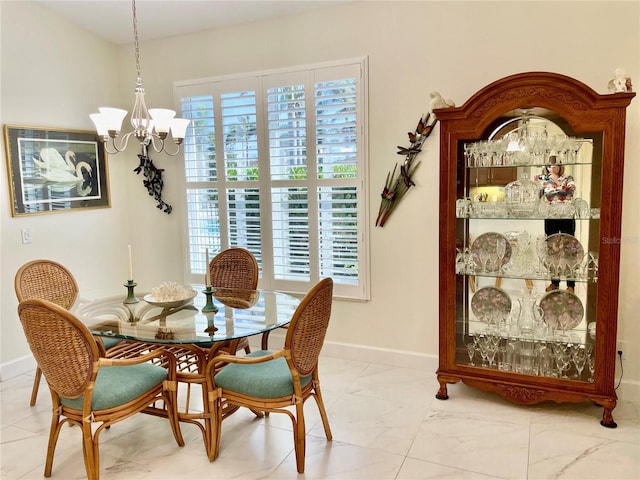 dining area with a chandelier