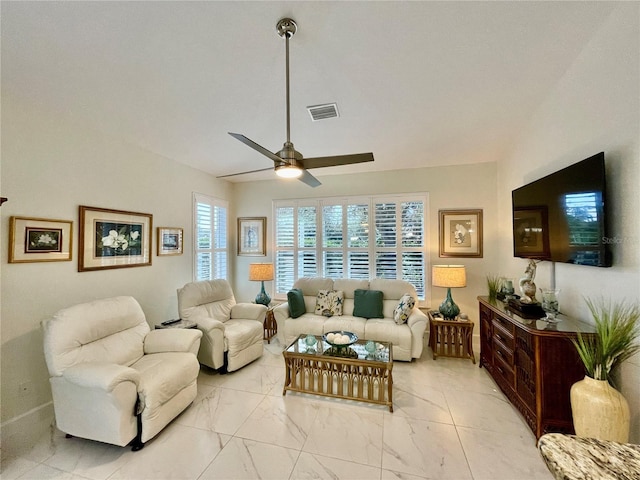 living room featuring ceiling fan