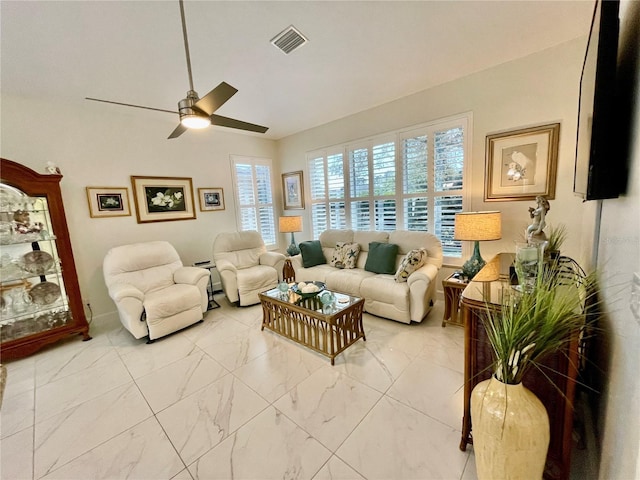 living room featuring ceiling fan