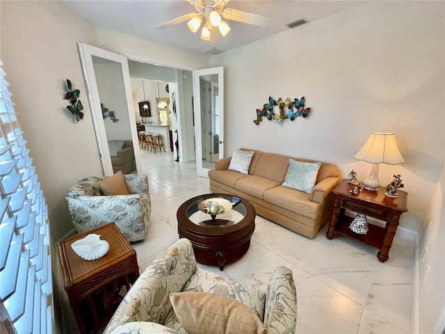 living room featuring ceiling fan