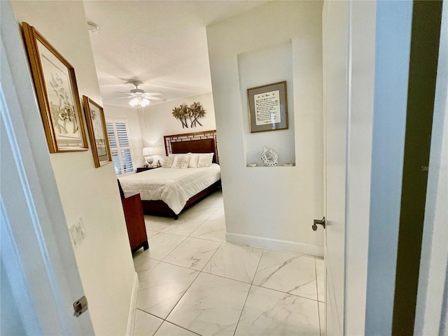 bedroom featuring ceiling fan