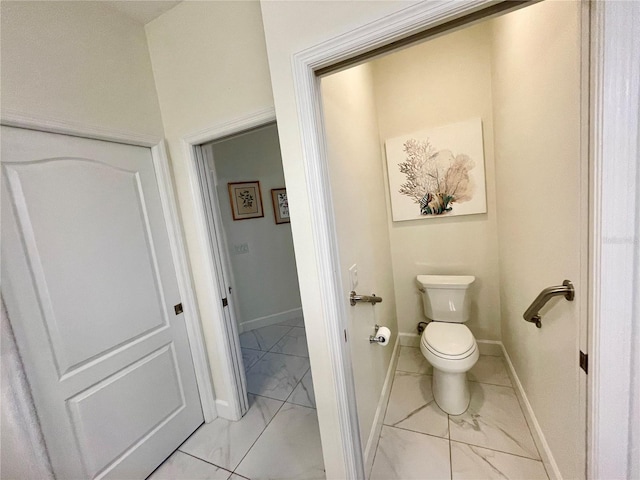 bathroom featuring toilet