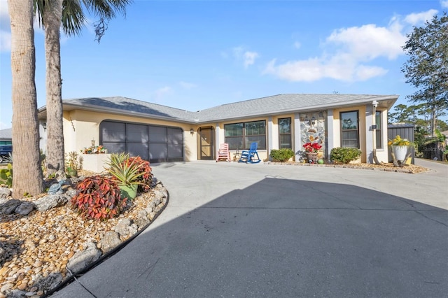 ranch-style house with a garage