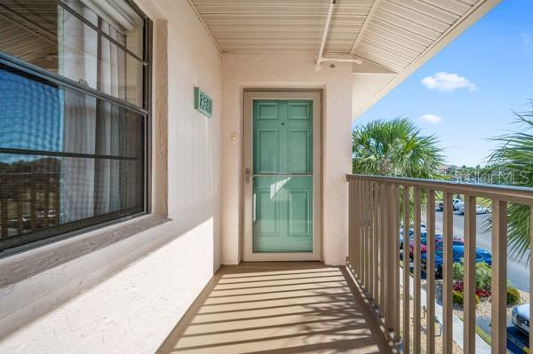 property entrance with a balcony