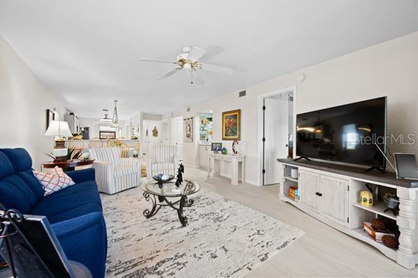 living room featuring ceiling fan