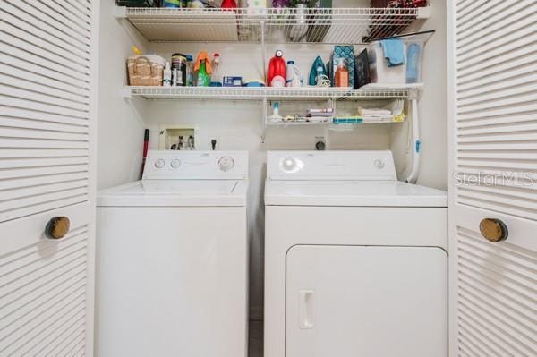 washroom featuring separate washer and dryer