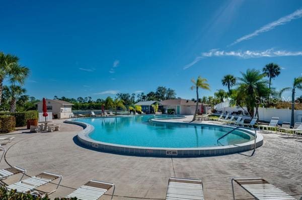 view of swimming pool with a patio area