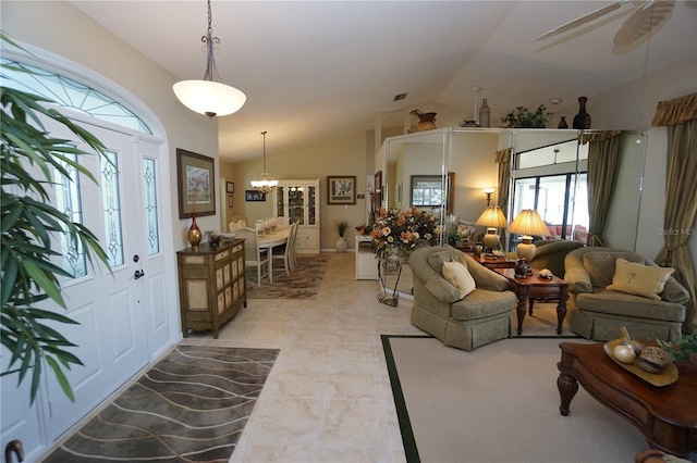 entrance foyer featuring vaulted ceiling and ceiling fan