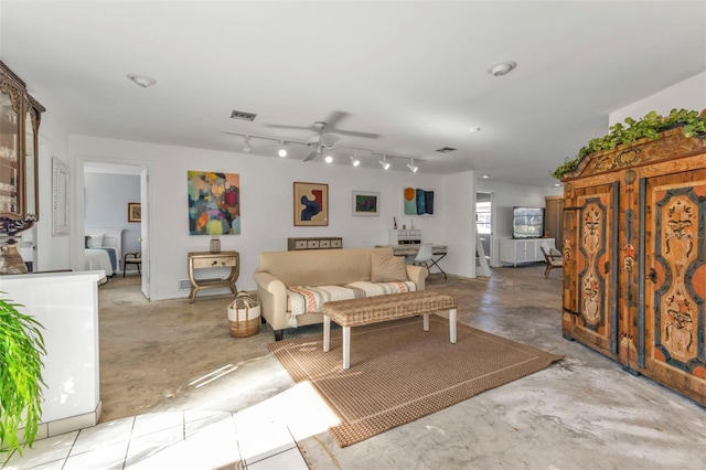 living room featuring ceiling fan